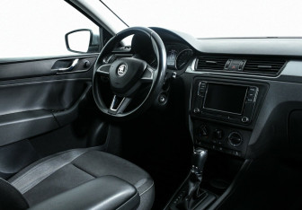Подержанный автомобиль Skoda Rapid Liftback 2015 года (5 фото)