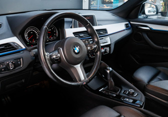 Подержанный автомобиль BMW X1 2018 года (13 фото)