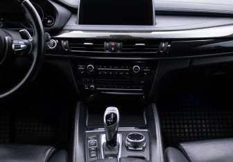 Подержанный автомобиль BMW X6 2014 года (14 фото)