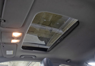 Подержанный автомобиль Kia Cerato Coupe 2012 года (22 фото)