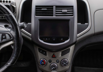 Подержанный автомобиль Chevrolet Aveo Sedan 2013 года (14 фото)