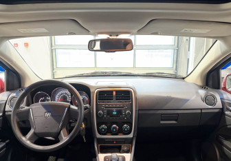 Подержанный автомобиль Dodge Caliber 2010 года (11 фото)