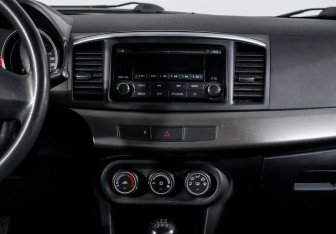 Подержанный автомобиль Mitsubishi Lancer Sedan 2014 года (9 фото)