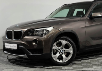 Подержанный автомобиль BMW X1 2014 года (15 фото)