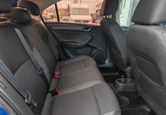 Подержанный автомобиль Skoda Rapid Liftback 2014 года (11 фото)
