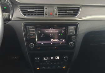 Подержанный автомобиль Skoda Rapid Liftback 2019 года (14 фото)