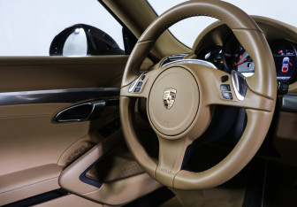 Подержанный автомобиль Porsche Cayman 2016 года (13 фото)