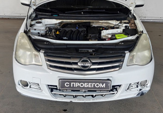 Подержанный автомобиль Nissan Almera Sedan 2014 года (14 фото)