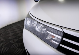 Подержанный автомобиль Toyota Corolla Sedan 2013 года (17 фото)
