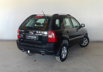 Подержанный автомобиль Kia Sportage 2010 года (7 фото)
