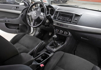 Подержанный автомобиль Mitsubishi Lancer Sedan 2014 года (11 фото)
