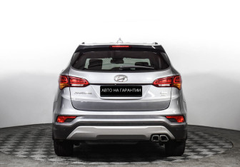 Подержанный автомобиль Hyundai Santa Fe 2015 года (4 фото)