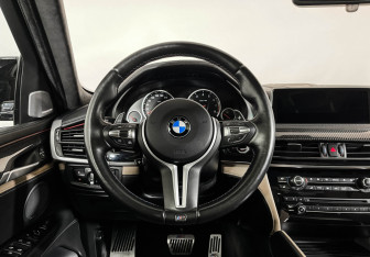 Подержанный автомобиль BMW X6 M 2016 года (18 фото)