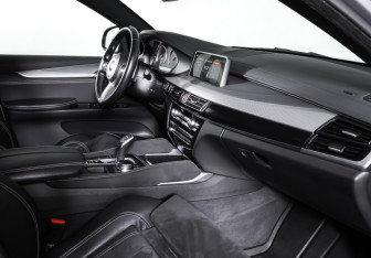 Подержанный автомобиль BMW X6 2018 года (11 фото)