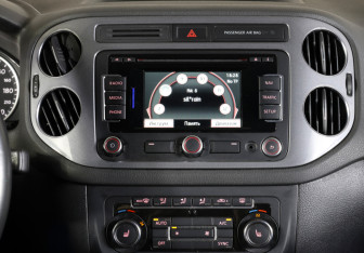 Подержанный автомобиль Volkswagen Tiguan 2013 года (13 фото)