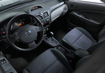 Подержанный автомобиль Nissan Almera Classic 2012 года (7 фото)