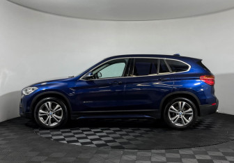 Подержанный автомобиль BMW X1 2015 года (5 фото)