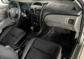 Подержанный автомобиль Nissan Almera Classic 2008 года (10 фото)