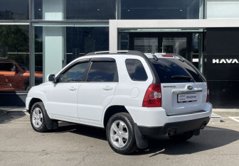 Подержанный автомобиль Kia Sportage 2010 года (7 фото)