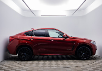 Подержанный автомобиль BMW X6 2015 года (6 фото)