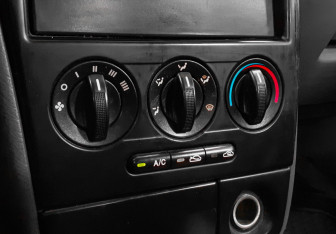 Подержанный автомобиль Kia Spectra Sedan 2006 года (14 фото)