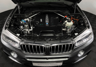 Подержанный автомобиль BMW X6 2017 года (10 фото)