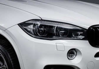 Подержанный автомобиль BMW X5 2015 года (16 фото)