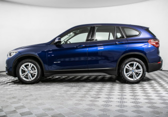 Подержанный автомобиль BMW X1 2017 года (8 фото)