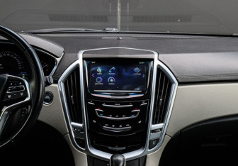 Подержанный автомобиль Cadillac SRX 2014 года (10 фото)