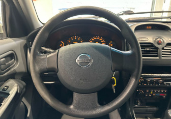 Подержанный автомобиль Nissan Almera Classic 2006 года (13 фото)