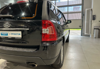 Подержанный автомобиль Kia Sportage 2009 года (10 фото)