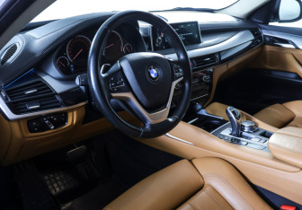Подержанный автомобиль BMW X6 2016 года (14 фото)
