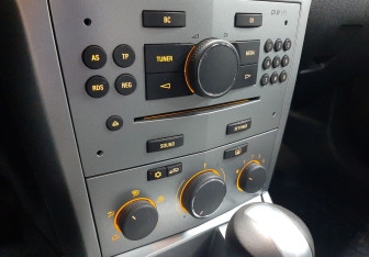 Подержанный автомобиль Opel Astra Wagon 2014 года (15 фото)