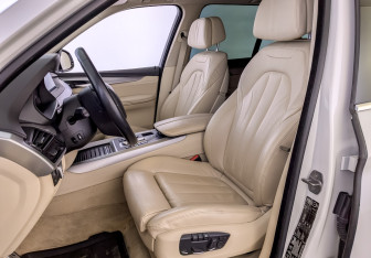 Подержанный автомобиль BMW X5 2014 года (20 фото)