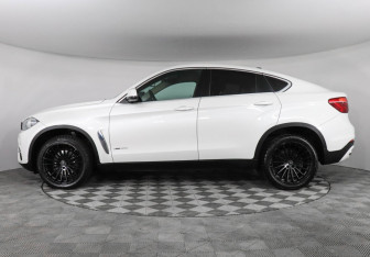 Подержанный автомобиль BMW X6 2015 года (5 фото)