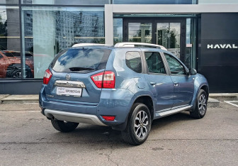 Подержанный автомобиль Nissan Terrano 2014 года (5 фото)