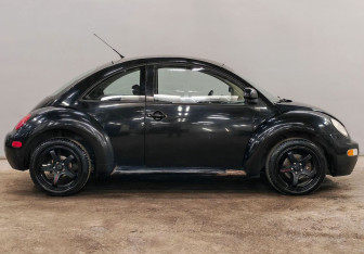 Подержанный автомобиль Volkswagen Beetle Hatchback 1999 года (5 фото)