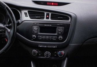 Подержанный автомобиль Kia Ceed Wagon 2014 года (14 фото)