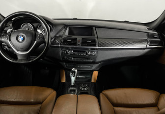 Подержанный автомобиль BMW X6 2010 года (11 фото)