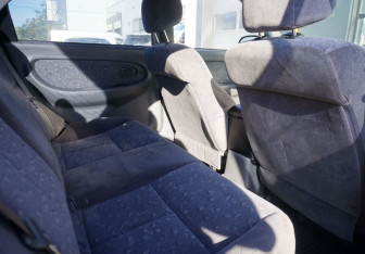 Подержанный автомобиль Kia Spectra Sedan 2009 года (10 фото)
