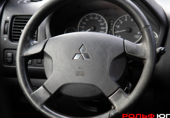 Подержанный автомобиль Mitsubishi Space Star Compactvan 2004 года (11 фото)