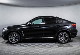 Подержанный автомобиль BMW X6 2017 года (8 фото)