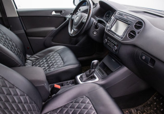 Подержанный автомобиль Volkswagen Tiguan 2014 года (9 фото)