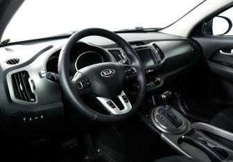 Подержанный автомобиль Kia Sportage 2014 года (11 фото)