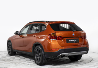 Подержанный автомобиль BMW X1 2014 года (7 фото)