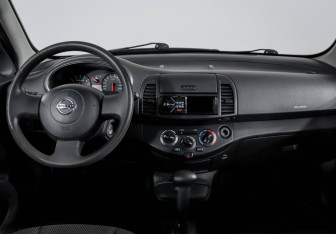 Подержанный автомобиль Nissan Micra Hatchback 2009 года (11 фото)