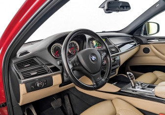 Подержанный автомобиль BMW X6 M 2011 года (15 фото)