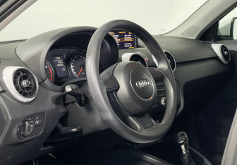 Подержанный автомобиль Audi A1 2013 года (13 фото)