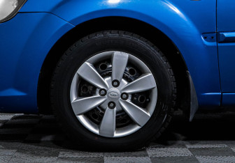 Подержанный автомобиль Kia Rio Sedan 2011 года (15 фото)
