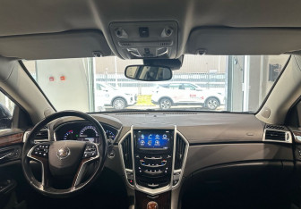 Подержанный автомобиль Cadillac SRX 2013 года (15 фото)